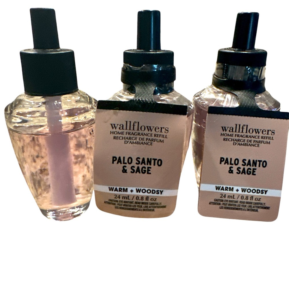 3 Bath and Body Works Wallflowers 
2 brand new and 1 used 
Palo Santo & Sage